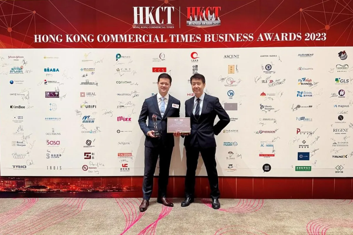 A photo of Mr Benjamin Liang, Deputy Chairman (left) and Mr Joseph Tsang, General Manager (right) of Polytek Engineering Company Limited was taken in front of a backdrop with the award-winning companies' logo printed on it.