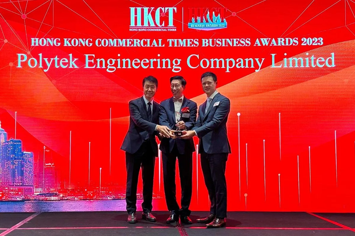 The award was presented to Mr Benjamin Liang, Deputy Chairman (right) and Mr Joseph Tsang, General Manager (left) of Polytek Engineering Company Limited by Dr Chan Yue Kwong Michael, Honorary Chairman of the Hong Kong Institute of Marketing (centre) at the award ceremony.